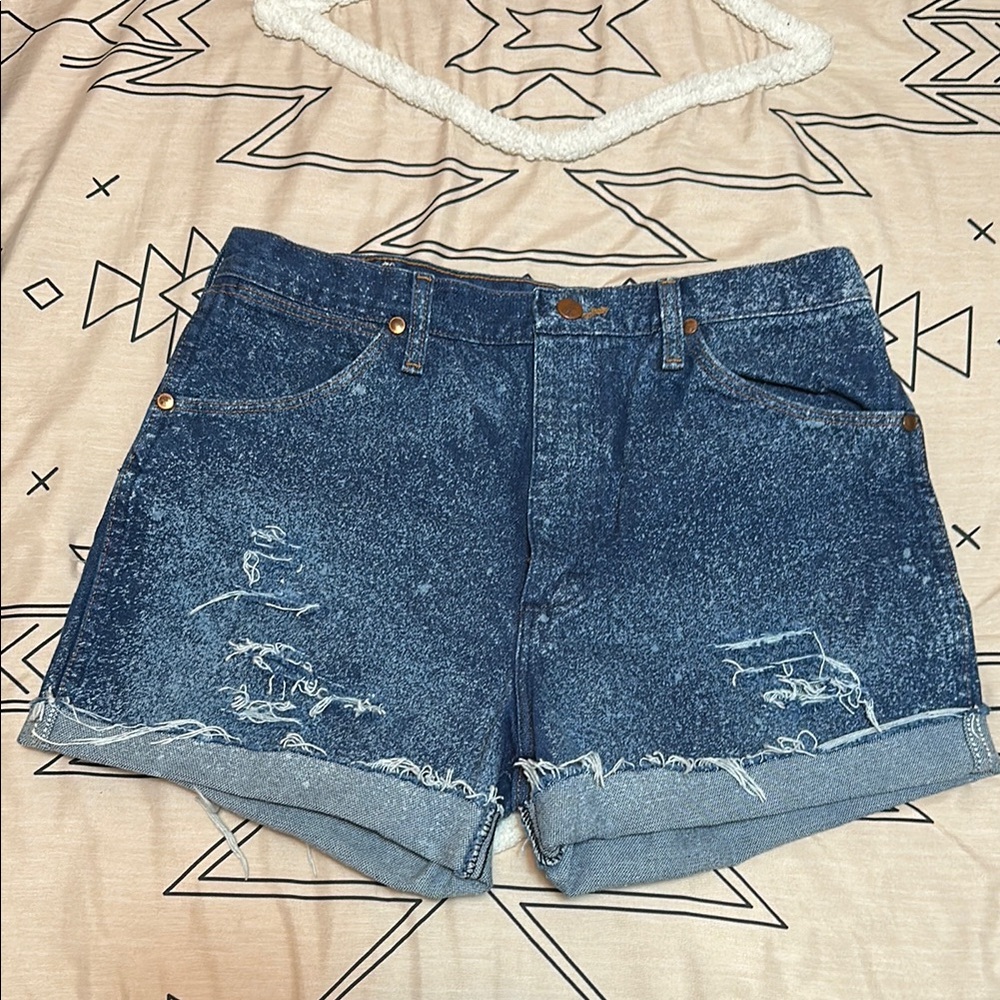 Vintage custom distressed Wrangler cut off shorts